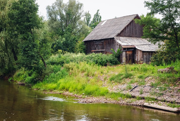 Old wooden barn over Liwiec River in Masovian Voivodeship of Poland