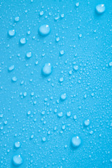 Water drops on blue background