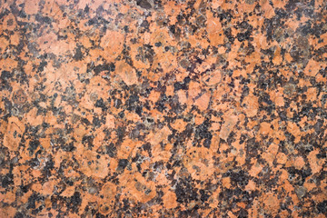 Orang and black marble stone, background