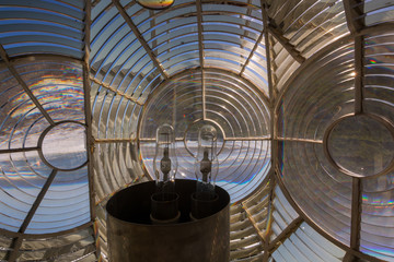 Unusual view from inside the Fresnel lens at the top of Slangkop Lighthouse in South Africa