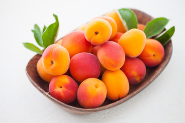 fresh apricots on white background