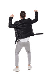 Bac view of a happy man in a leather jacket.