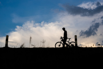 Obraz premium Ride on bike on the road. Sport and active life concept in the summer time