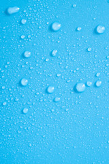 Water drops on blue background