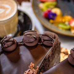 Chocolate mud cake with a cup of coffee