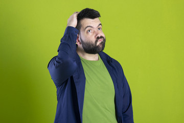 Bearded guy making think expression