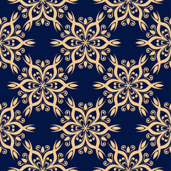 Golden flowers on blue background. Ornamental seamless pattern