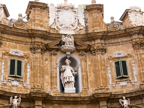 Palermo, Italy April, 2018: Statue of Saint Catherine at the Quattro Canti, Palermo Baroque facade at the sout-east corner in the historic center of Palermo