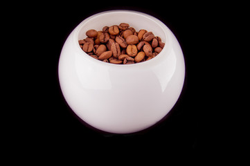 Obraz na płótnie Canvas coffee grains in a glass ball