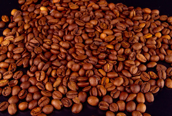 Coffee grains on a black background