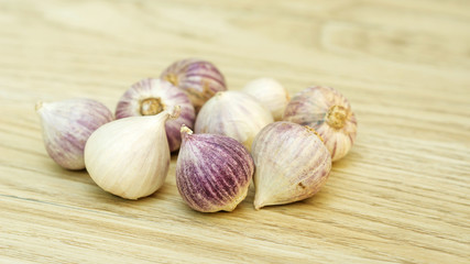 Elephant Garlic (Allium Sativum Linn.) on a wooden table.