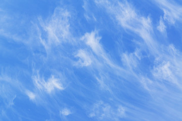 blye sky with white fluffy clouds background.