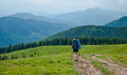 Fototapeta na wymiar woman in mountains, hiking, backpaking
