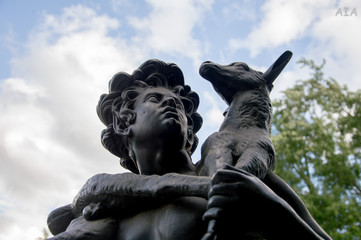 Obraz premium elf with lamb on his shoulders