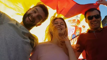 Spanish fans greeting winning match, tourism and support of national team