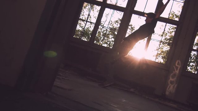 epic slow-motion backflip with long airtime in the evening sun 