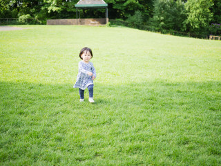 Baby girl play at outdoor playground