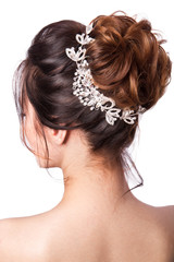 Beautiful bride with fashion wedding hairstyle - on white background