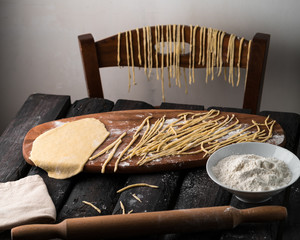 homemade pasta, rustic style, dark wood, 