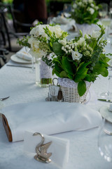 napkin in the form of a crane on a festive table