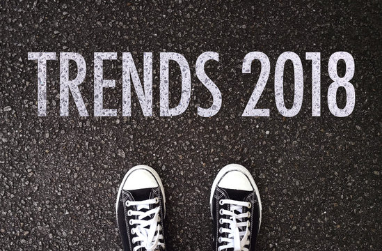 Trends 2018 wording on road with shoes.