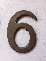 Written Wording in Distressed State Typography Found Number Six 6