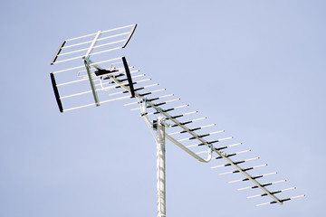 TV antenna and blue sky is close