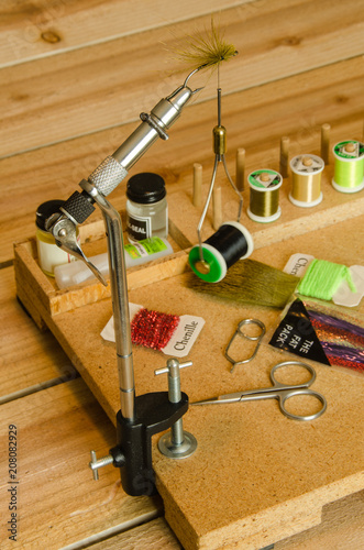Fly Tying Bench With Assorted Instruments Stock Photo And
