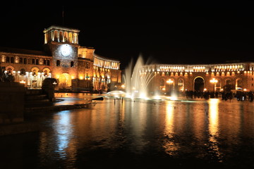 Fototapeta na wymiar Fountain at the Government of the Republic of Armenia at night, it is located on Republic Square in Yerevan, Armenia.