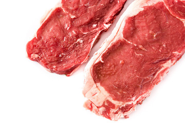 Obraz premium Raw beef steak ready to be cooked isolated on white background