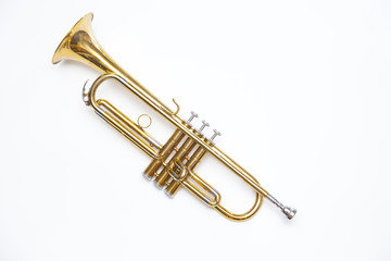 gold trumpet on white background