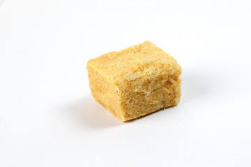 Flaky sweet Soan papdi  patisa son papri sohan papdi shonpapri on white background