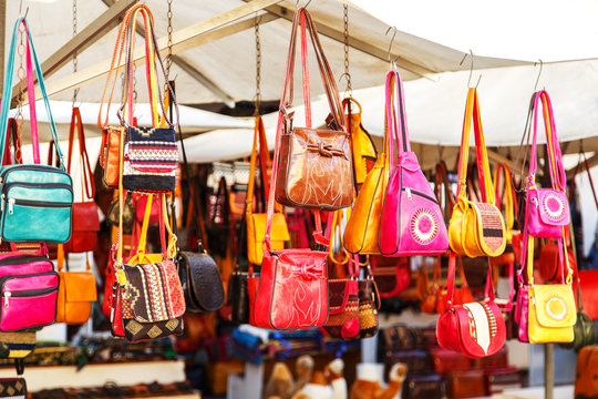 Leather and textile bags in tunisian market.