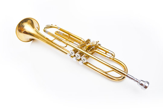 gold trumpet on white background
