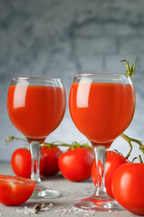 Tomato Juice and Fresh Tomatoes isolated on a White Background