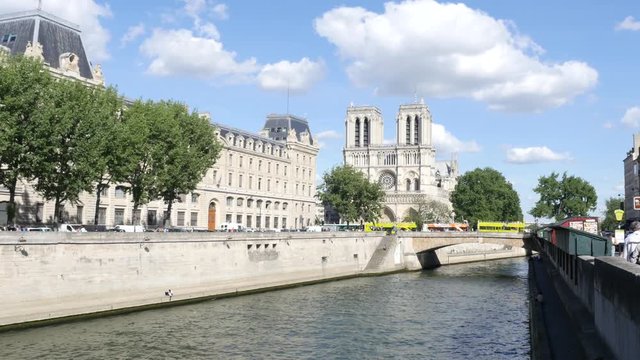 Water channel of river Seine and Notre Dame de Paris building