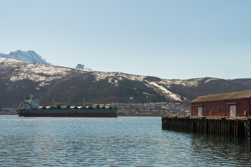 A cargo ship at the port of Narvik, Norway