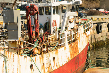 Obraz na płótnie Canvas A rusty ship at the port of Narvik, Norway