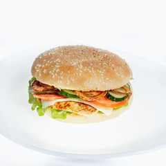 Burger with chicken cutlet, on a white background.