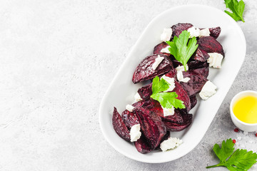 Healthy roasted beetroot feta cheese salad. Selective focus, space for text.