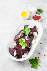 Healthy roasted beetroot feta cheese salad. Selective focus, space for text.