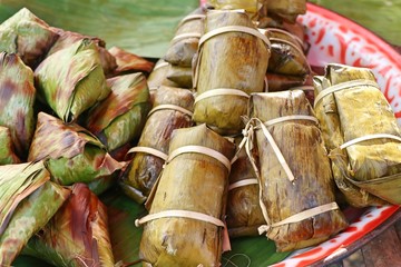 Sticky rice wrapped in banana leaves