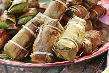 Sticky rice wrapped in banana leaves