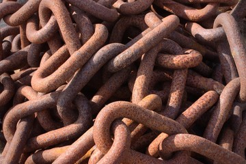 Close-up of old brown rusty metal chains