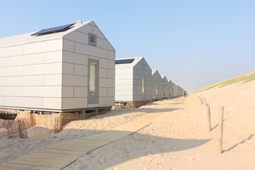 Naklejka premium White beach houses along the North Sea coast, Netherlands