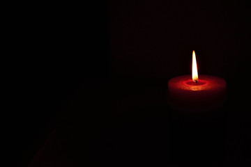 Candle siolated in the dark