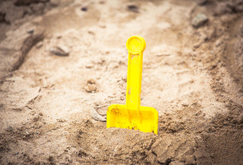 Fototapeta na wymiar Shovel in sand