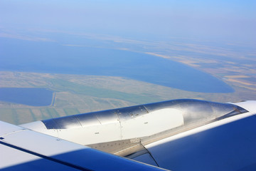Wing of an airplane in the sky