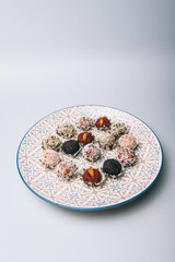 sweets from dried fruits with nuts and sesame seeds