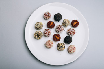 sweets from dried fruits with nuts and sesame seeds